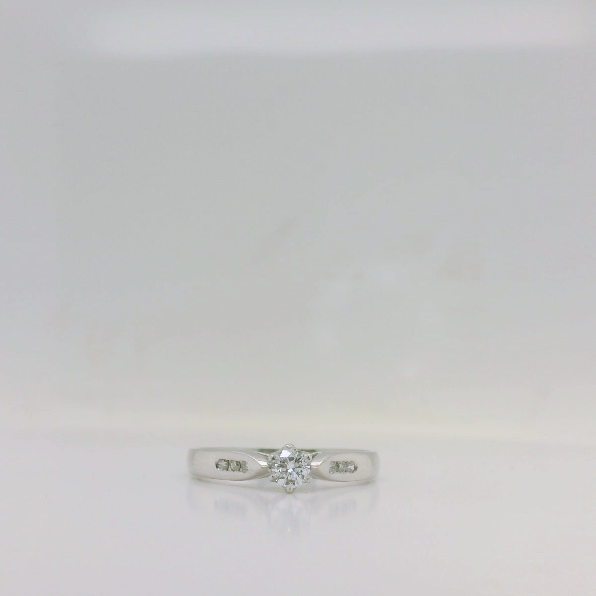 Channel Set Shoulder Diamond Ring