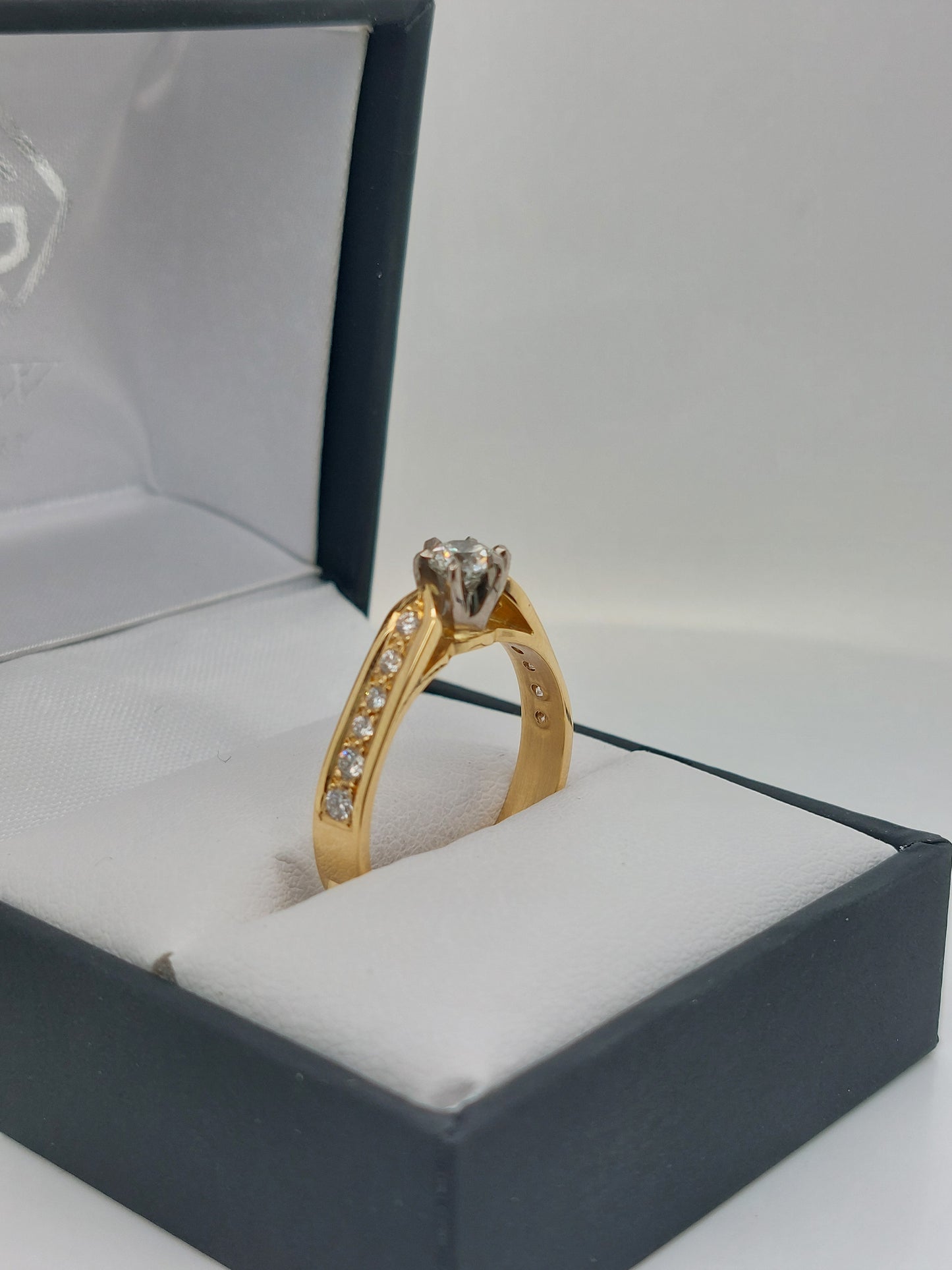 Solitaire & Shoulder Diamond Ring