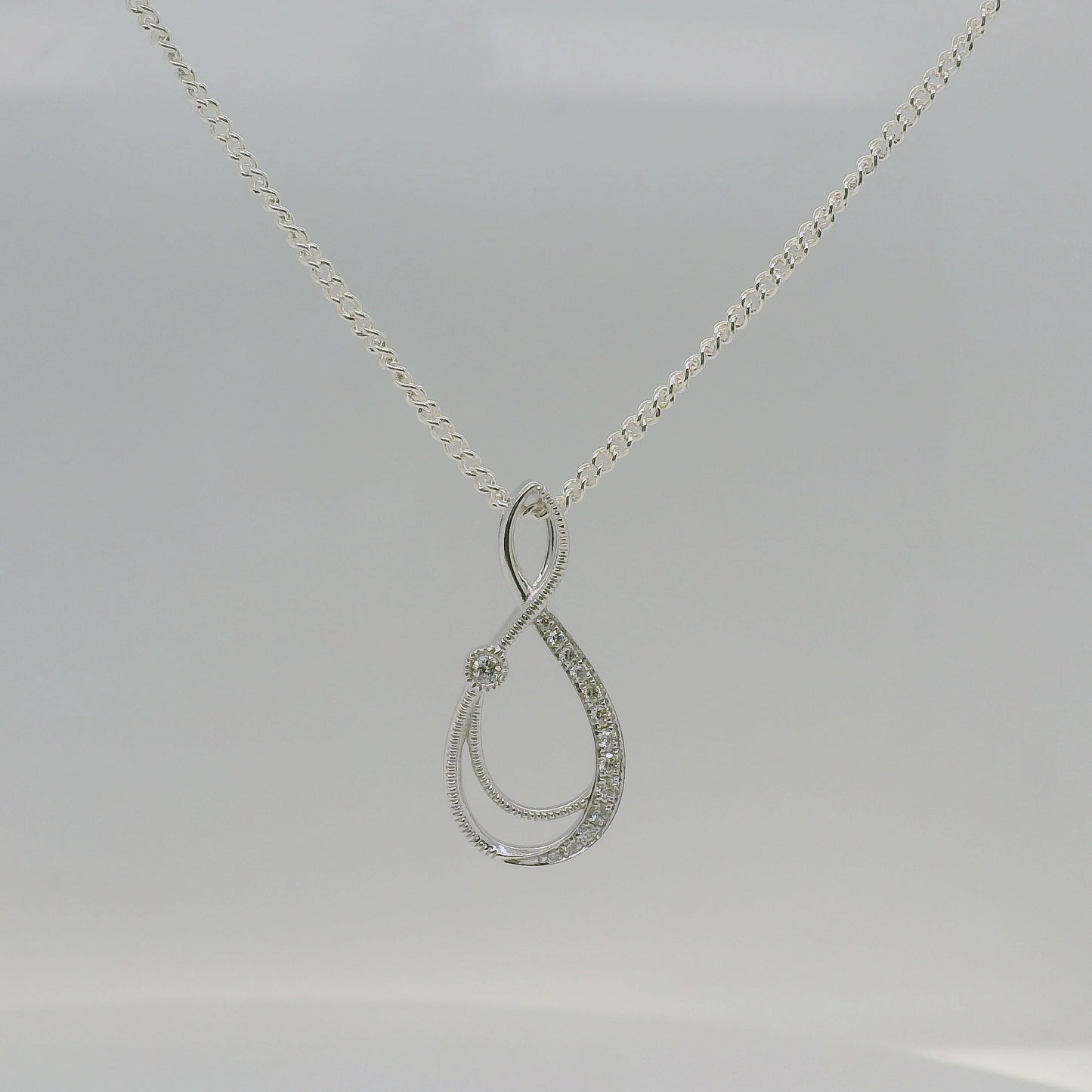 Diamond Set Figure 8 Pendant