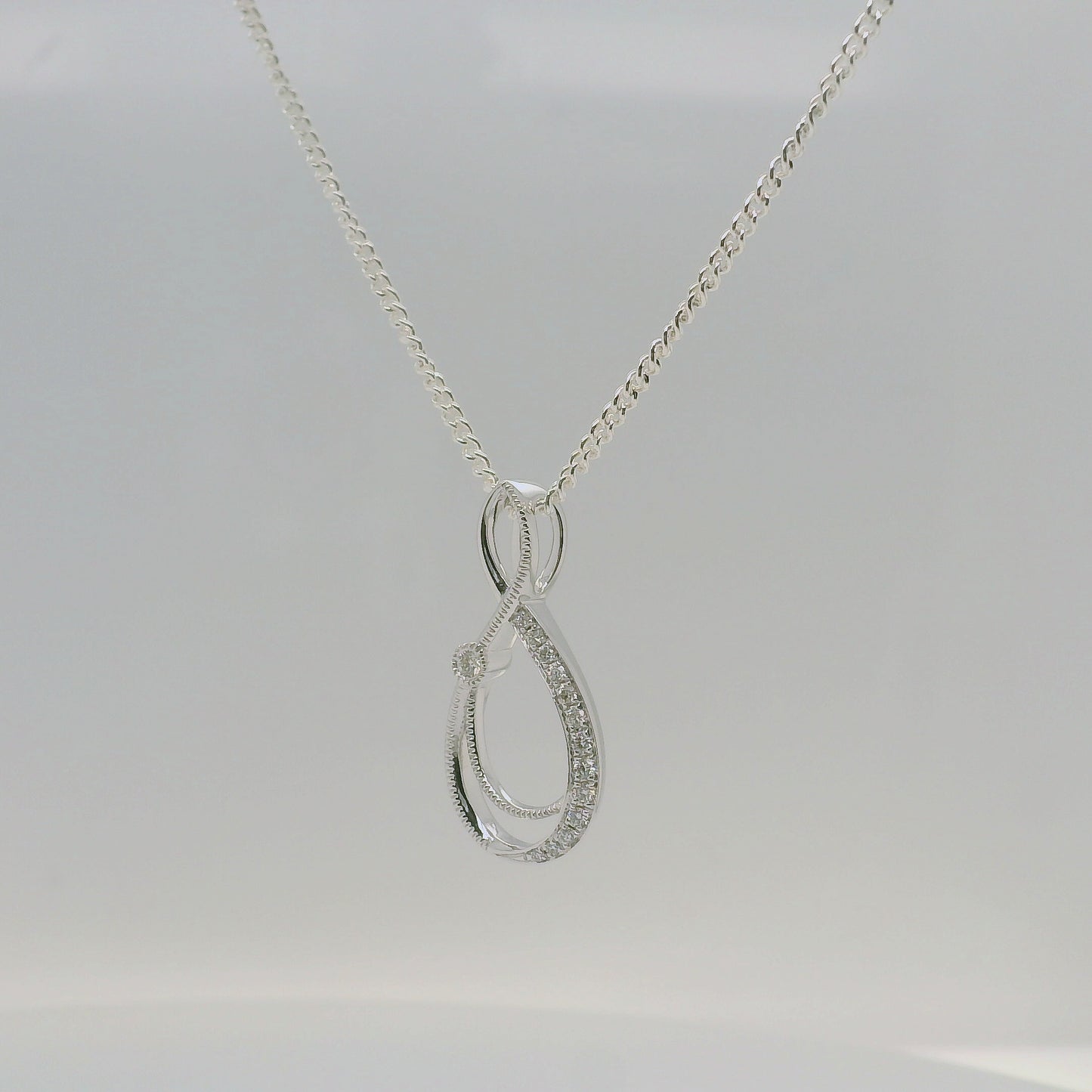 Diamond Set Figure 8 Pendant
