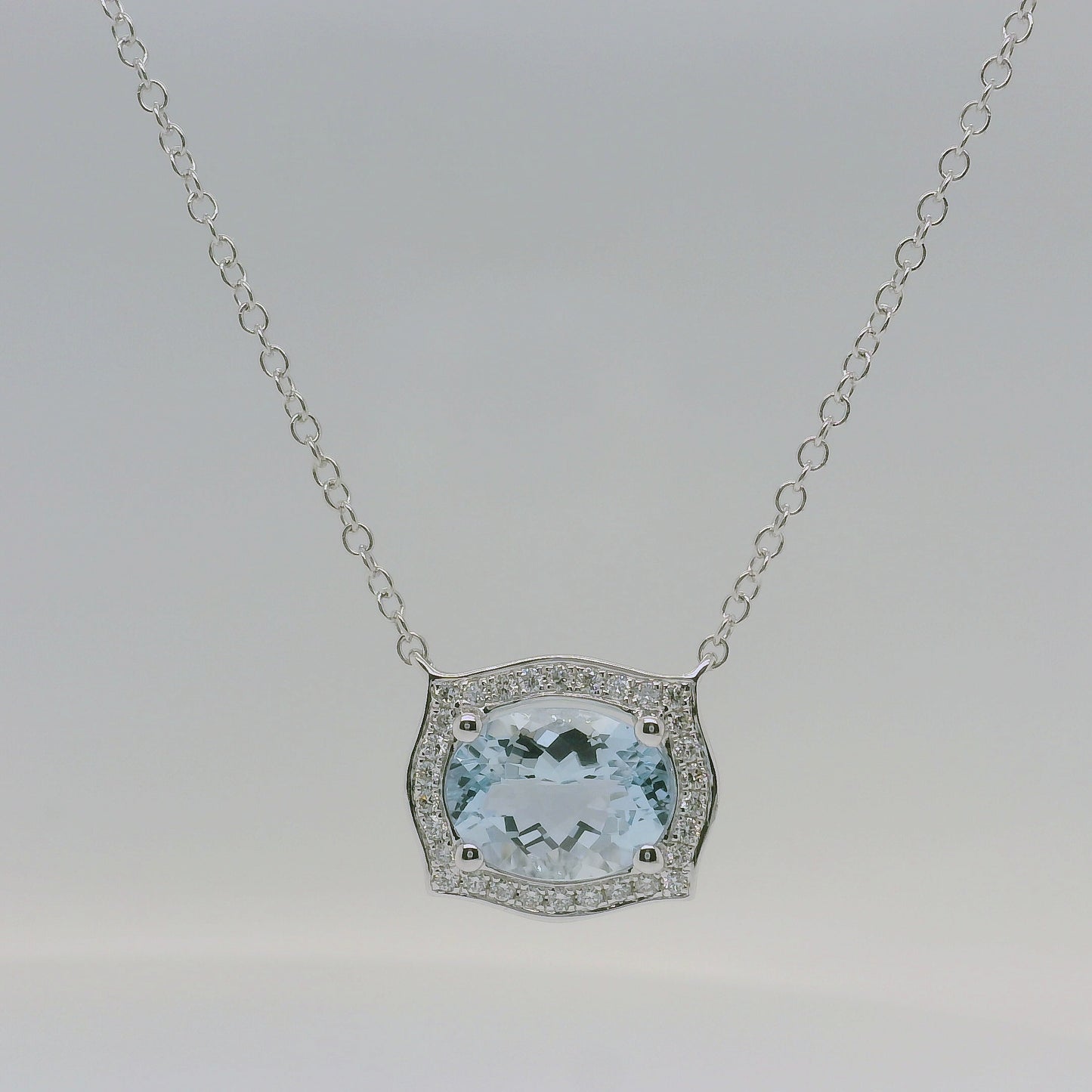 9ct White Gold Aquamarine &amp; Diamond Halo Pendant with Chain
