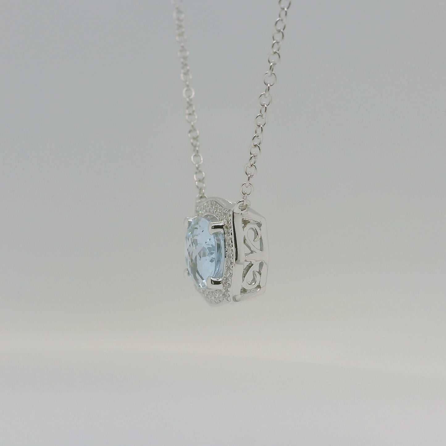 9ct White Gold Aquamarine &amp; Diamond Halo Pendant with Chain